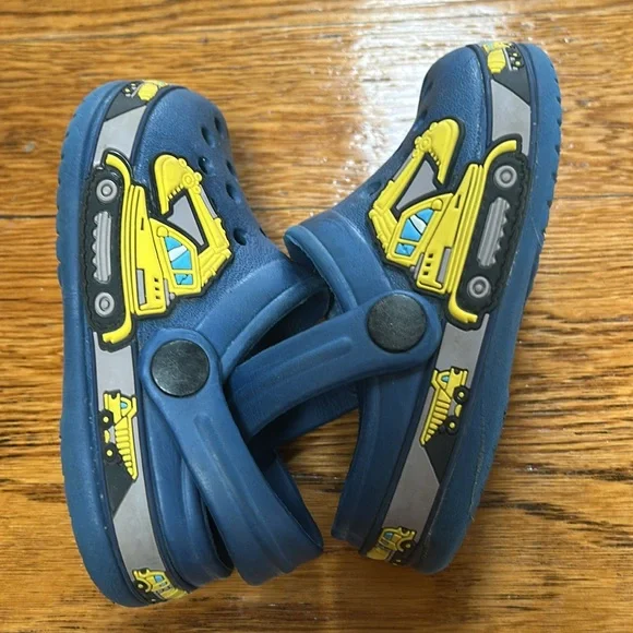 Folhaoth blue rubber open back clogs with yellow excavator on sides.  Toddler 8. - Picture 5 of 10